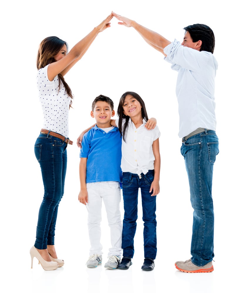 Happy family with kids under a safe roof  - isolated over white background